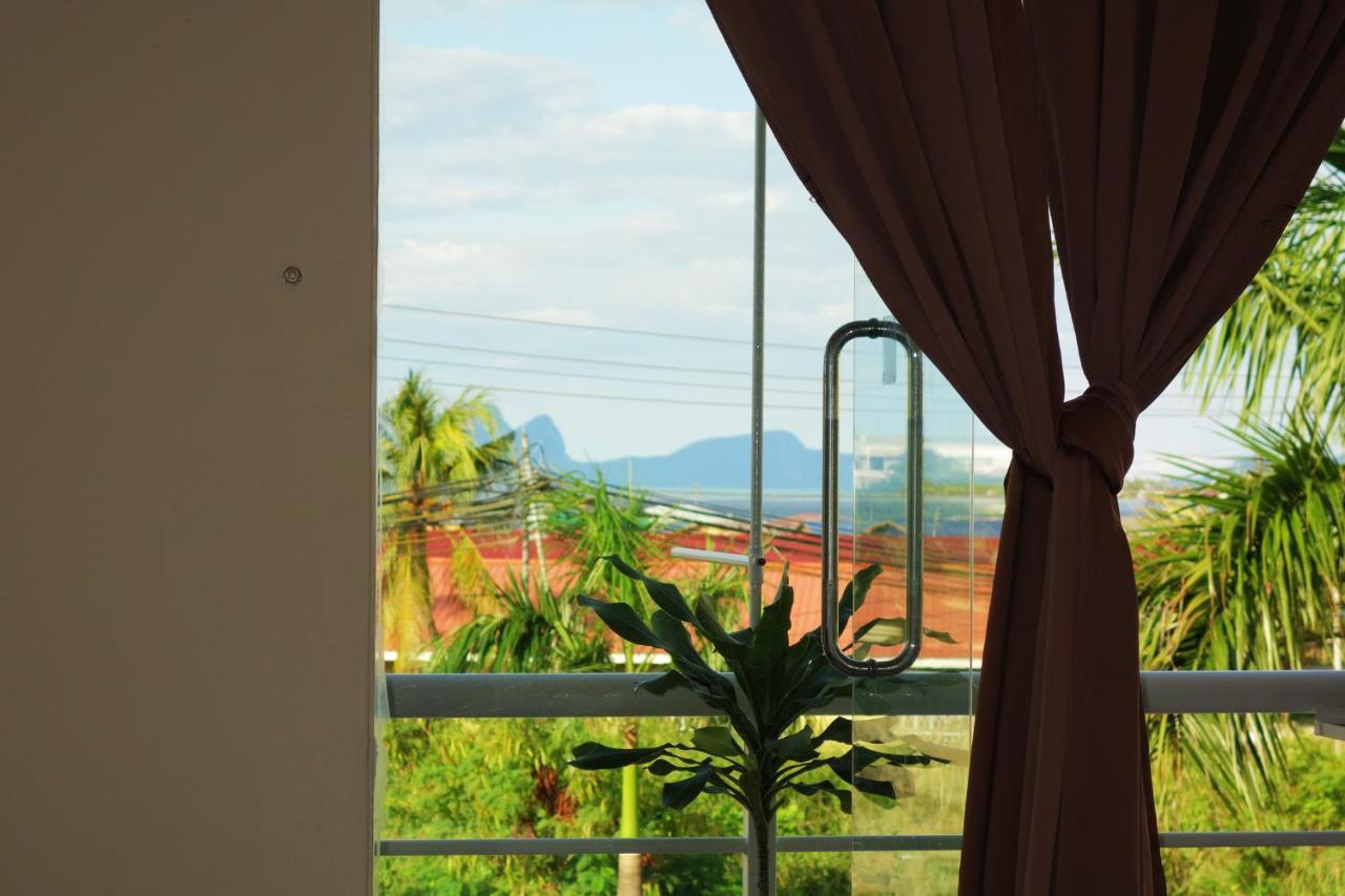AE Semporna Guesthouse 极潜旅店 Extérieur photo